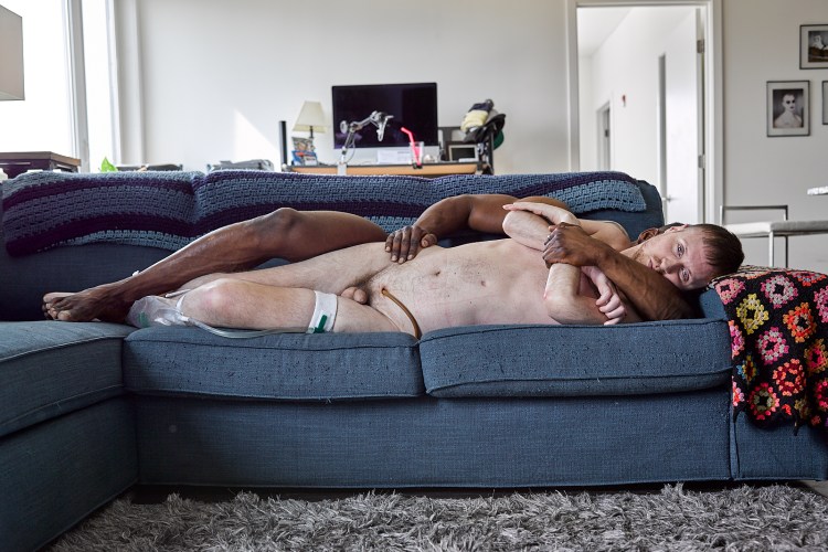 Cuddle on couch by Robert Andy Coombs